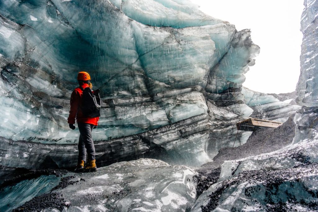 A woman at the Katla ice cave in Iceland